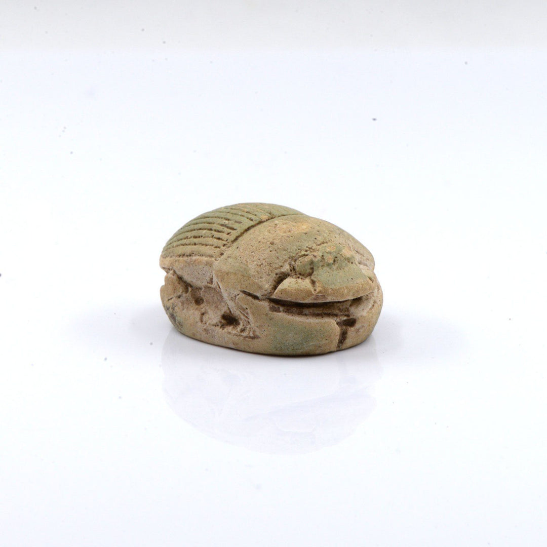 A large Egyptian Pale Green Glazed Scarab, Late Period, Dynasty 26, ca. 664 - 525 BCE - Sands of Time Ancient Art