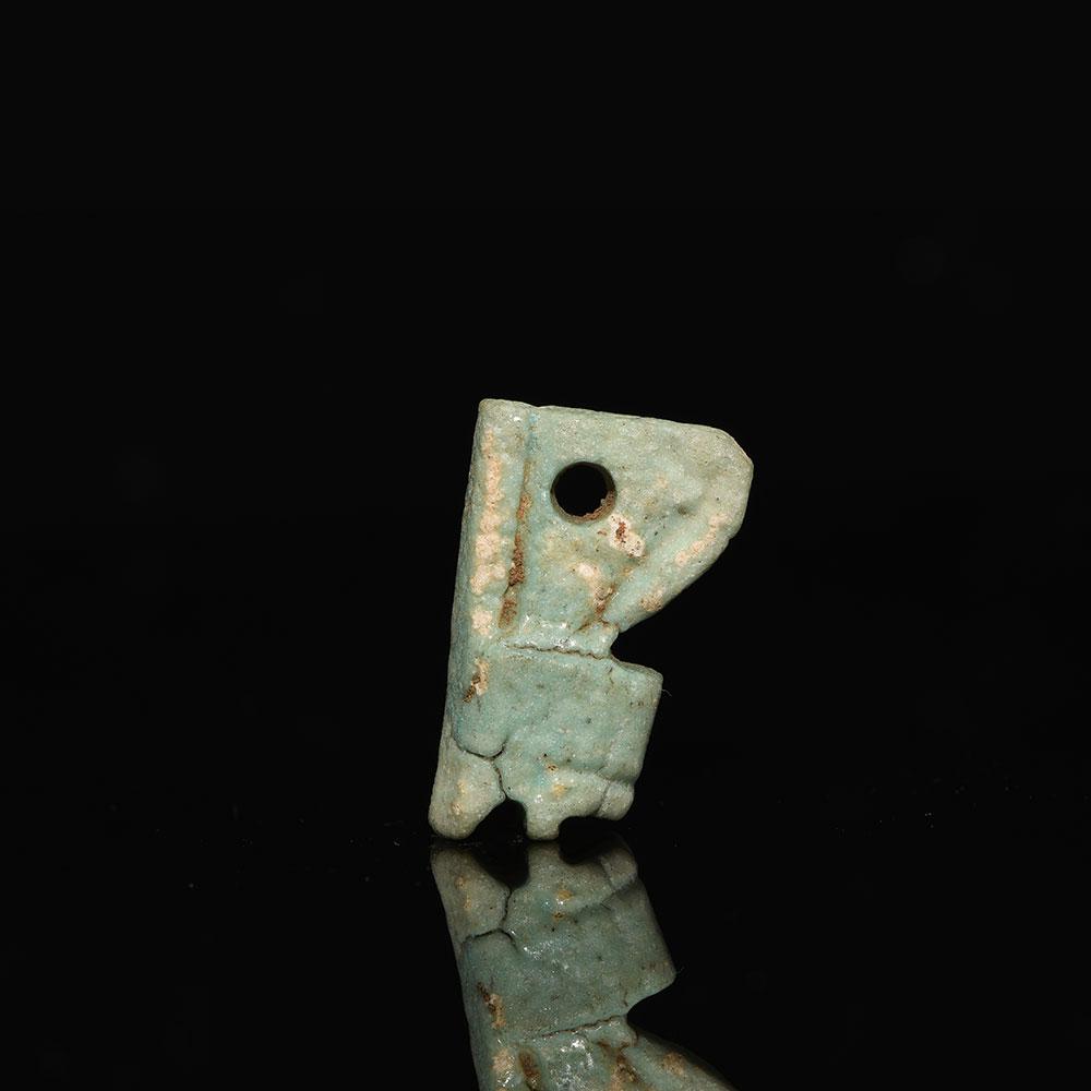 An Egyptian Faience 'Red Crown' Amulet, Late Period, ca. 664 - 332 BCE