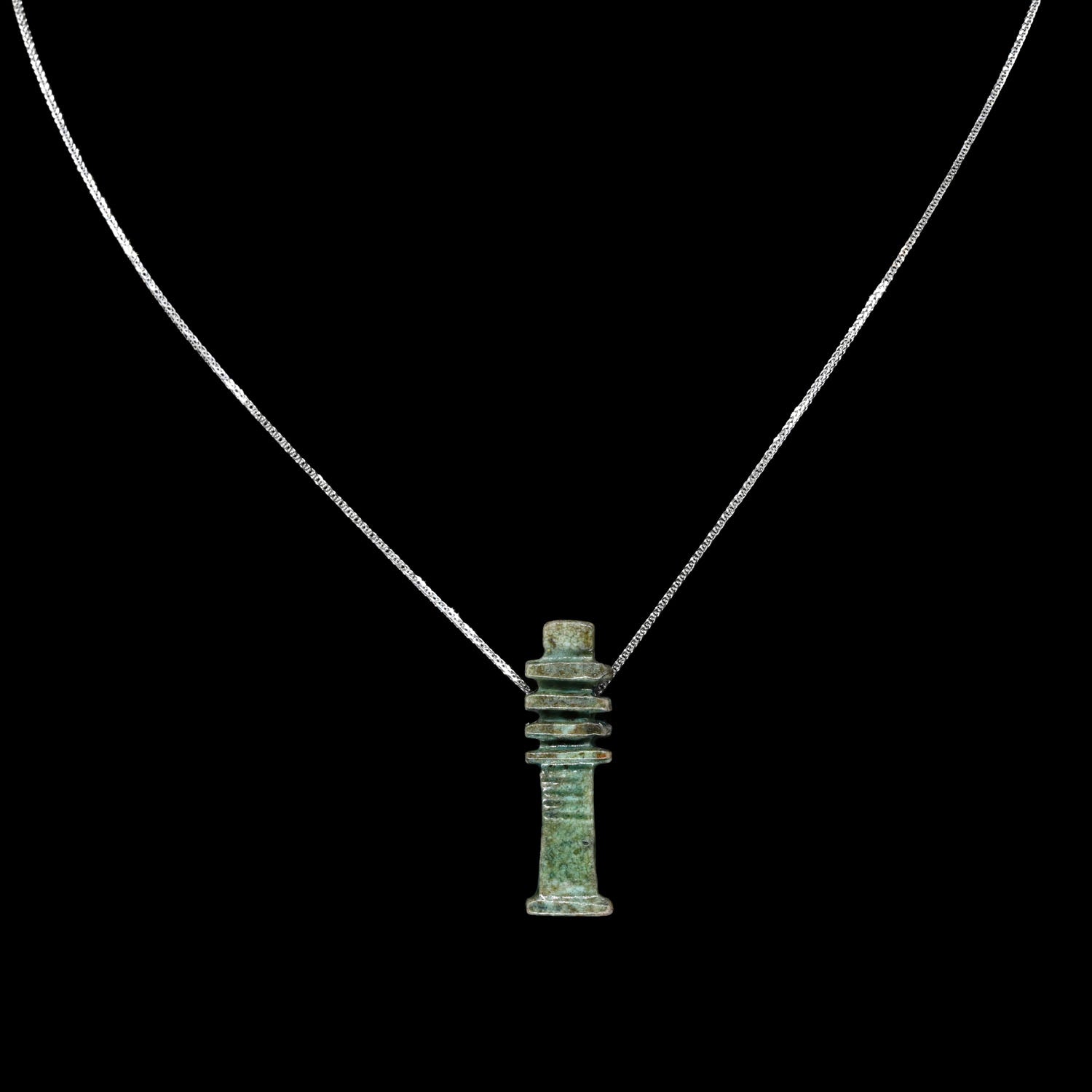 An Egyptian Green Faience Djed Pillar Amulet, 26th Dynasty ca. 664 - 525 BCE