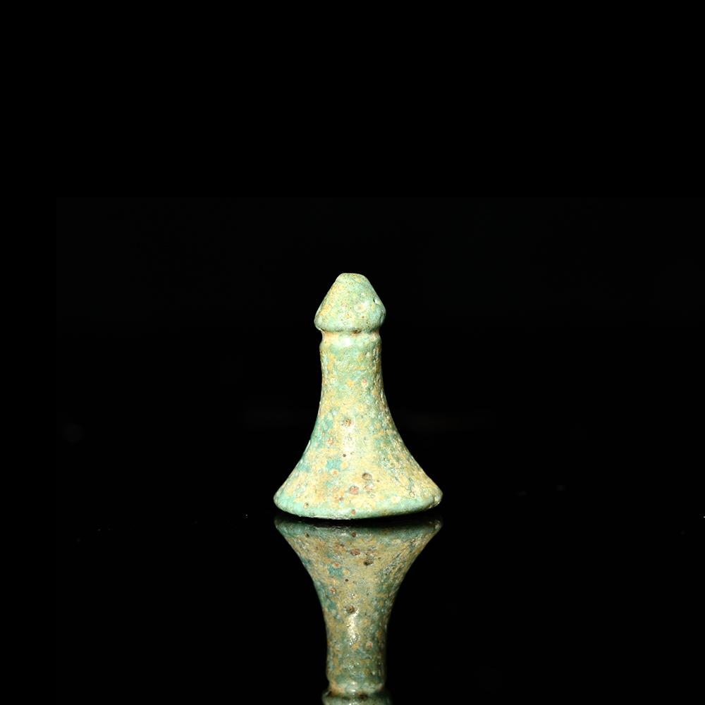 An Egyptian Faience Senet Gaming Piece, New Kingdom, ca. 1550 - 1069 BCE