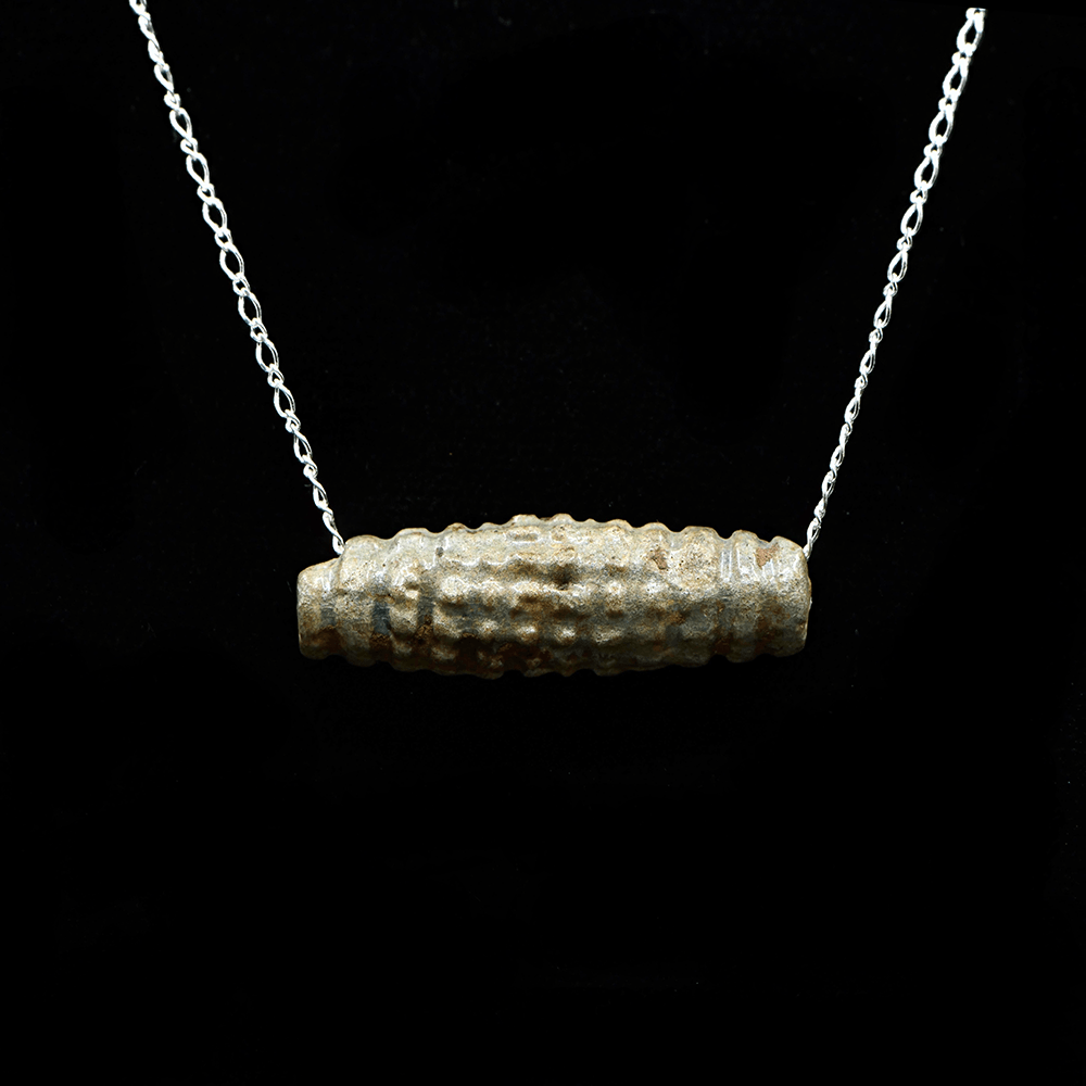 An Egyptian Faience Bead set as a pendant, Late Period, ca. 664 - 332 BCE