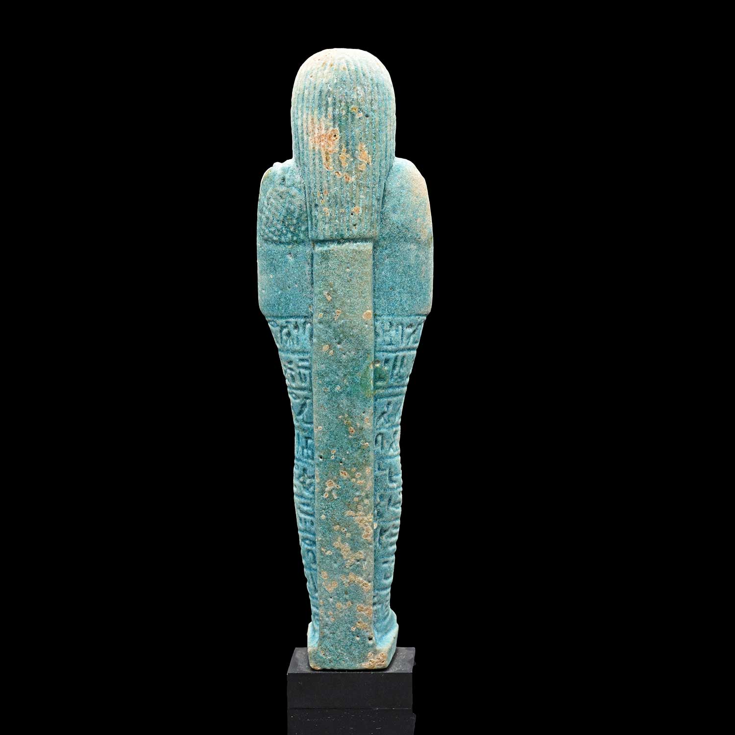 An Egyptian Blue Glazed Faience Ushabti for Nes-Ptah <br><em>Late Period, 30th Dynasty, ca. 380-332 BCE</em>