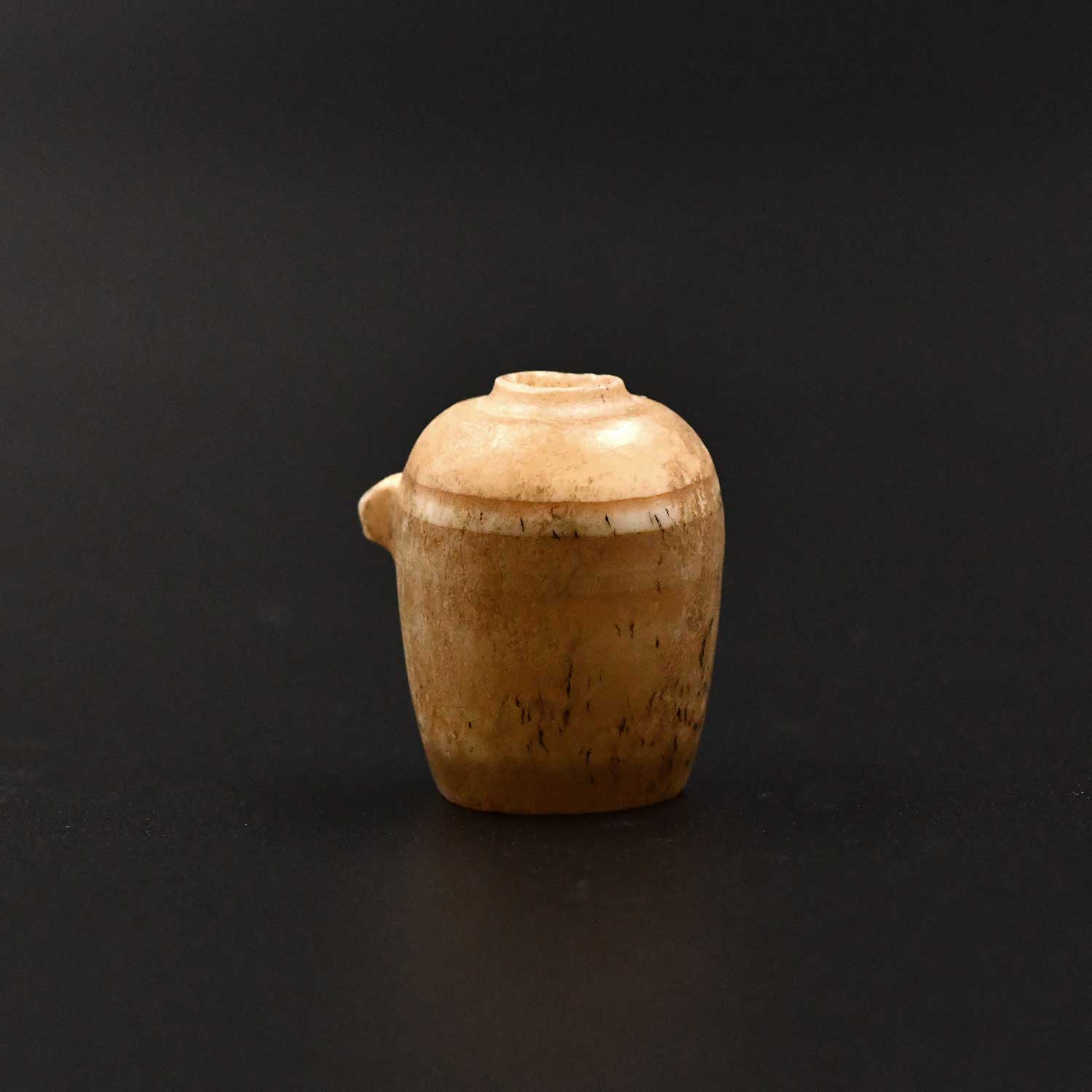 An Egyptian Alabaster Model Libation (nemset) Jar, Old Kingdom, ca. 2775 – 2650 BCE