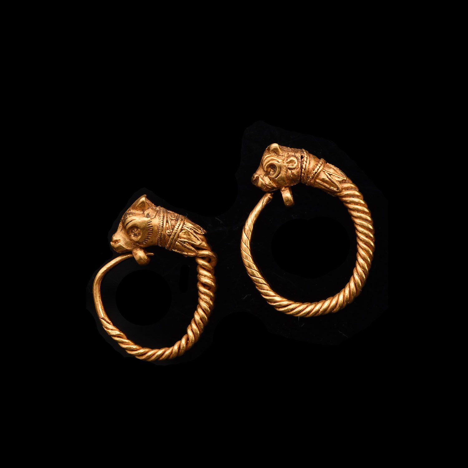 A fine pair of Greek Antelope Earrings, Hellenistic Period, ca. 3rd - 1st century BCE