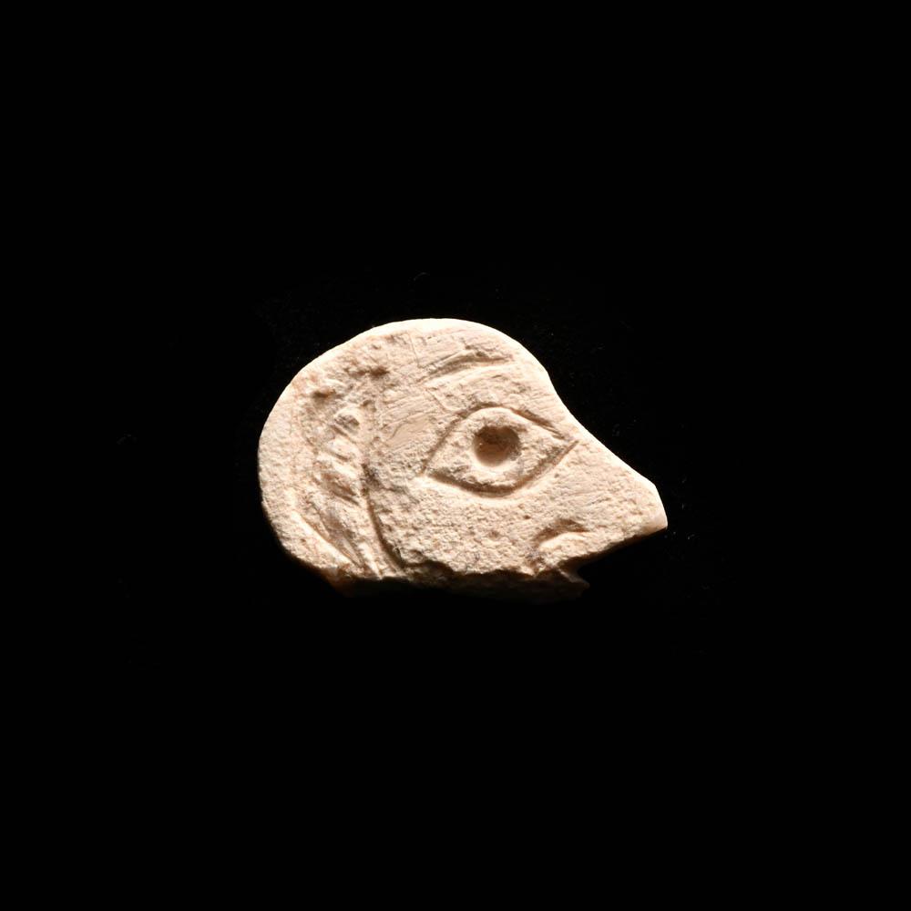 A Sumerian Limestone Portrait Inlay, ca. 3rd millennium BCE