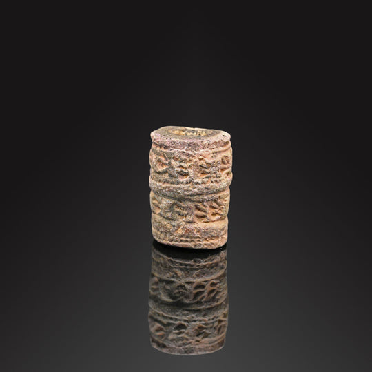 A Near Eastern Limestone Cylinder Seal, ca. 4th millennium BCE
