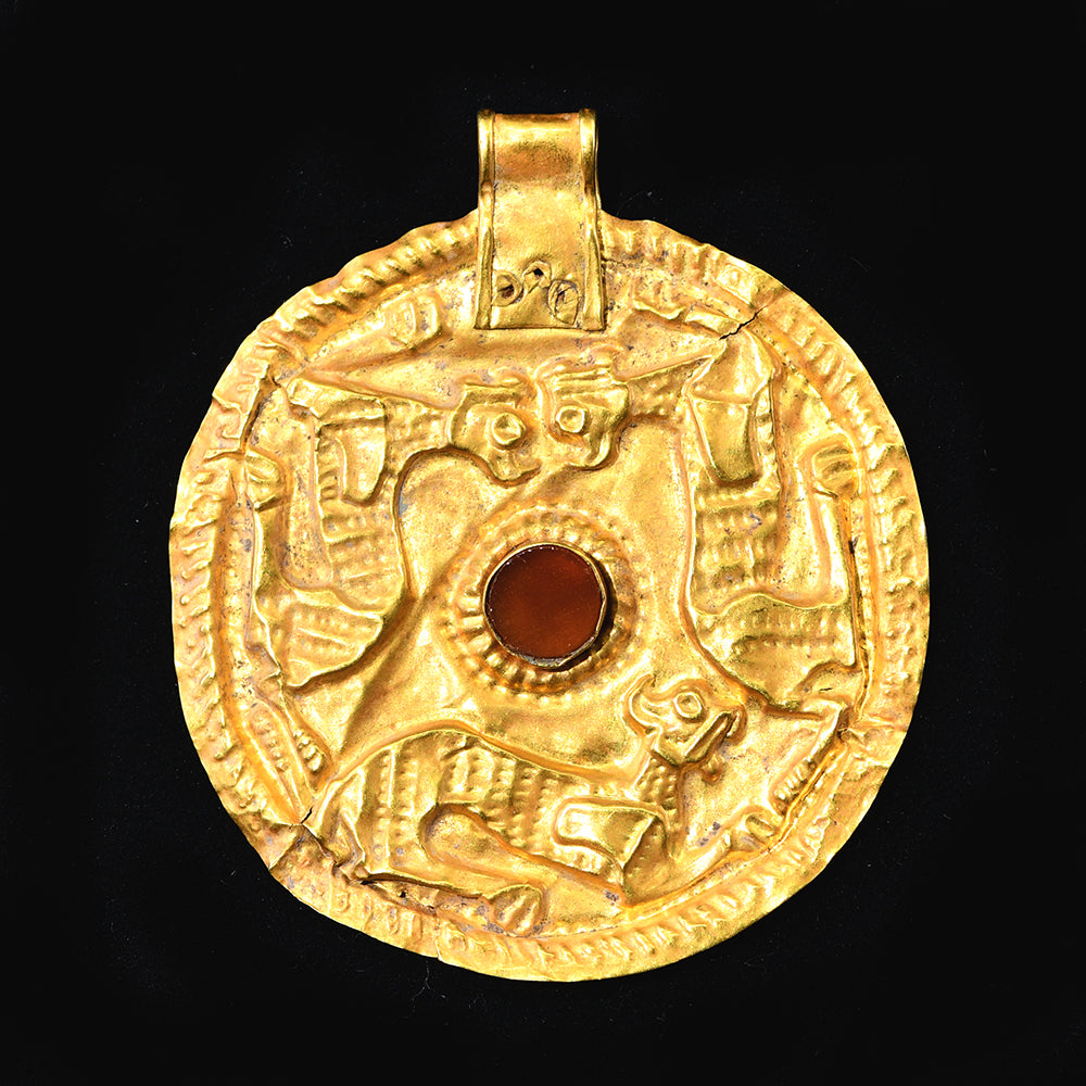 A superb Achaemenid Gold Repousse Pendant,  ca. 550 to 330 BCE