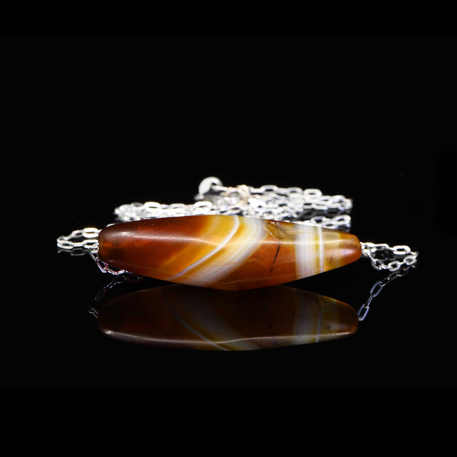 A Western Asiatic Banded Agate Bead Pendant, ca 1st millennium BCE - Sands of Time Ancient Art