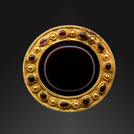 An Important Persian Eye Agate Pectoral, Parthian Period, ca. 1st century BCE - 1st century CE