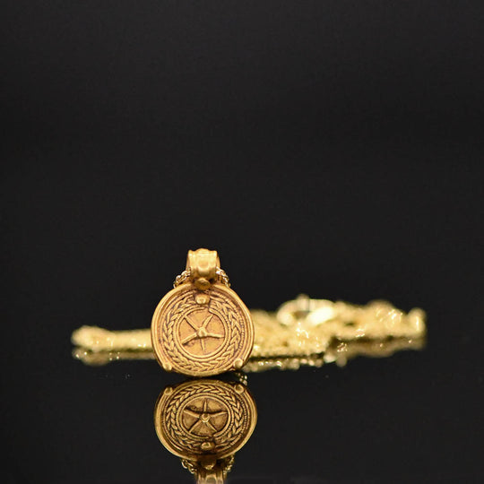 A Near Eastern Gold Pendant, Roman Period, ca. 1st century CE