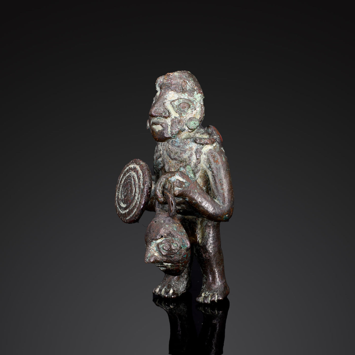 A Moche Solid Cast Copper Warrior Figure, ca. 500 - 800 CE