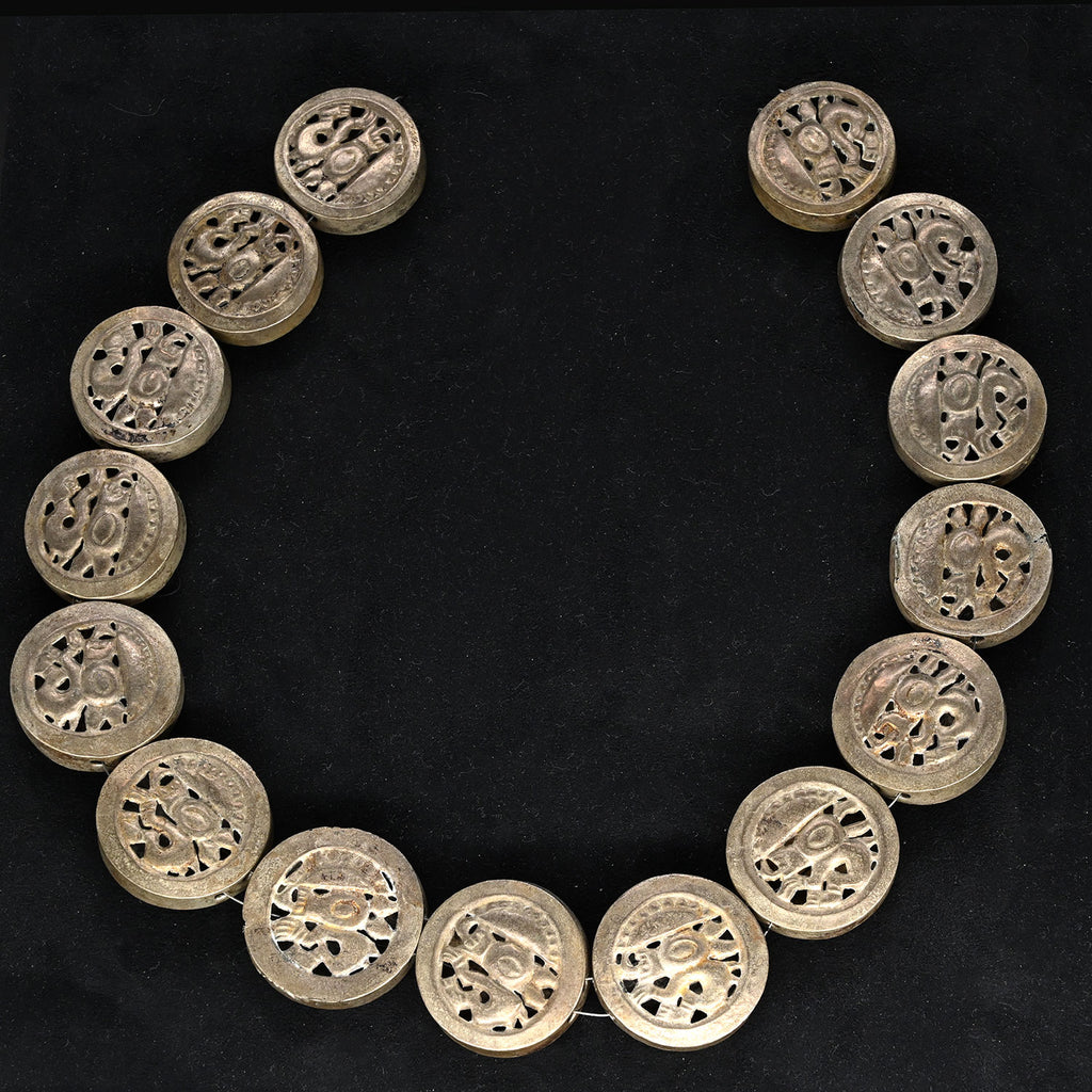 A rare set of Chimu Silver Roundel Medallions, Early Intermediate/Middle Horizon, ca. 500 CE