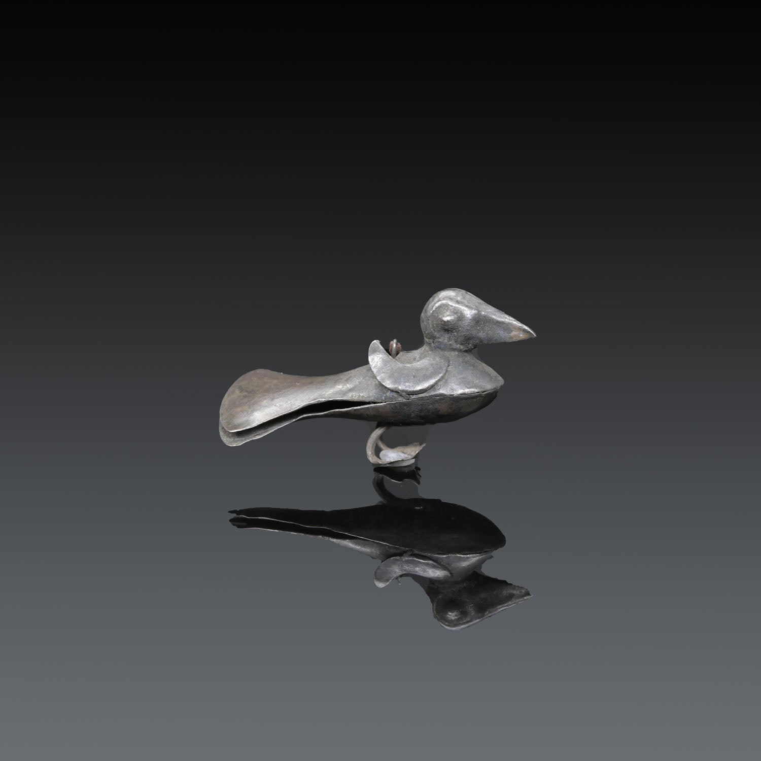 A Moche-Chimu Silver Sheet Bird Pendant<br><em>ca. 750 - 1000 CE</em>