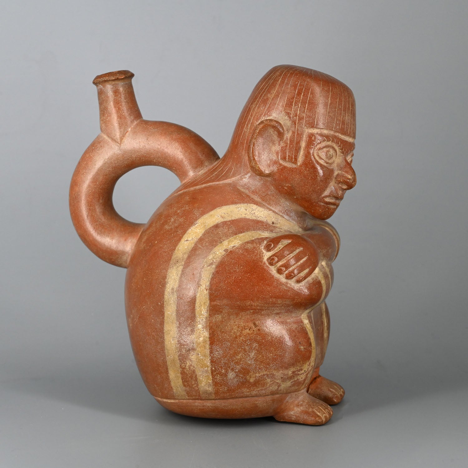 A Moche Stirrup Bottle with a Seated Man, ca. 200 - 400 CE