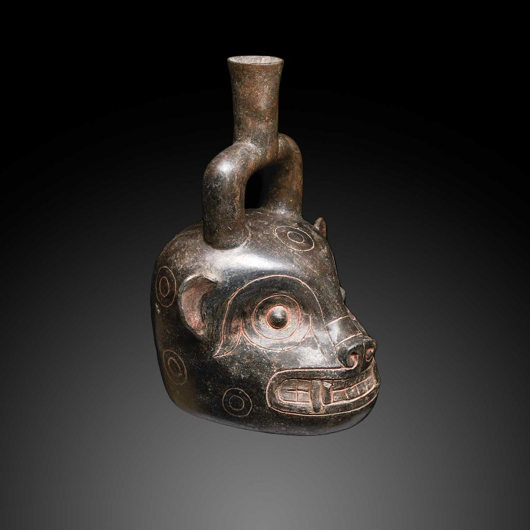 A Chavin Blackware Jaguar Head Stirrup Vessel, ca. 400 - 200 BCE