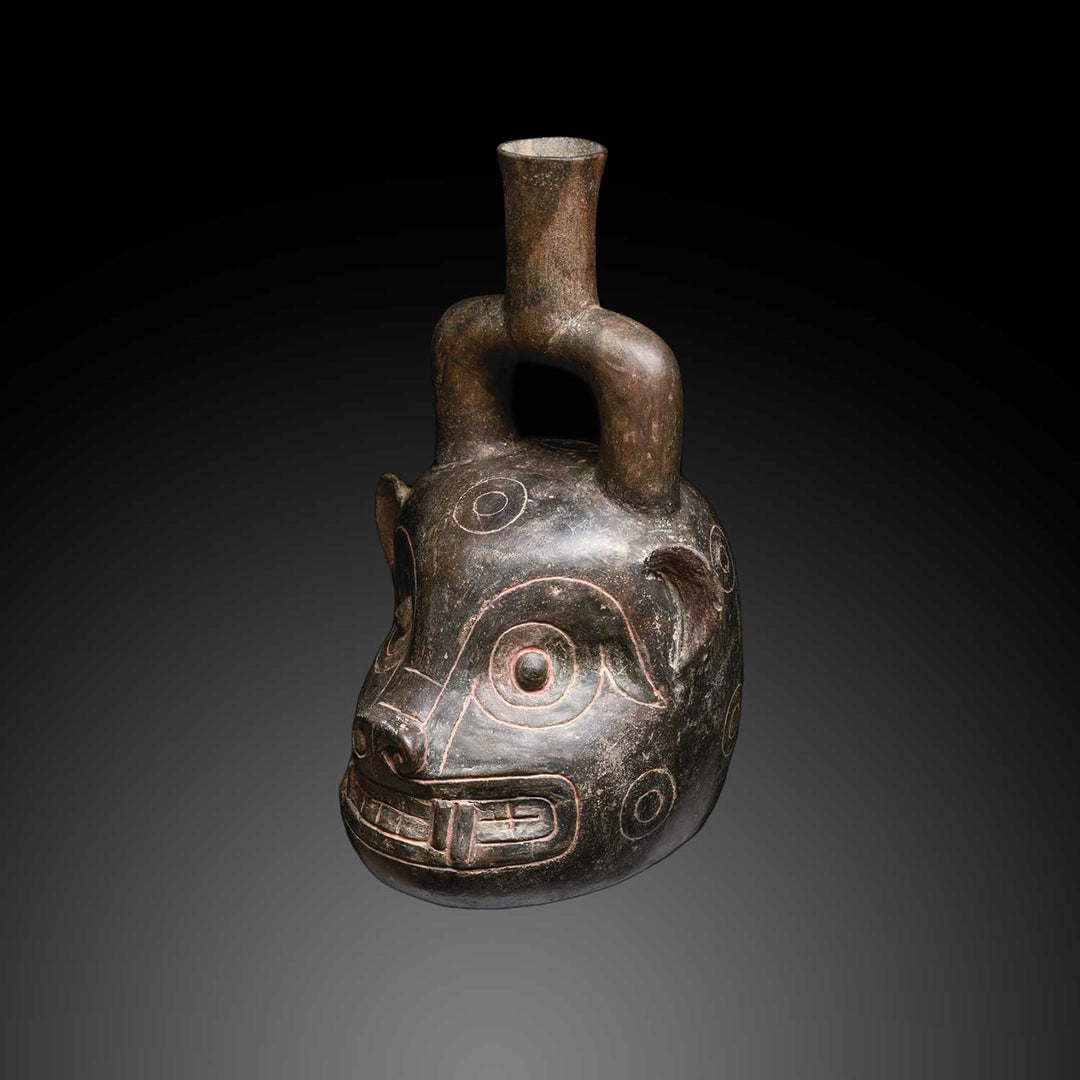 A Chavin Blackware Jaguar Head Stirrup Vessel, ca. 400 - 200 BCE