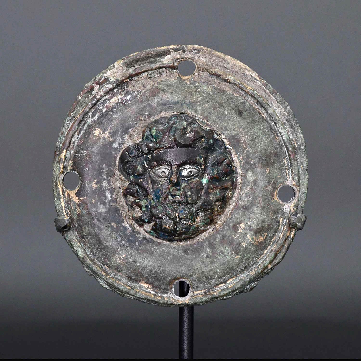 A Roman Bronze Roundel of Zeus-Ammon, ca. 1st - 2nd century CE