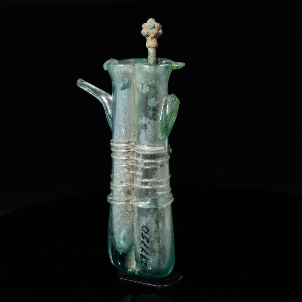 A Roman Glass Double Balsamarium with Applied Handles, ca. 4th century CE