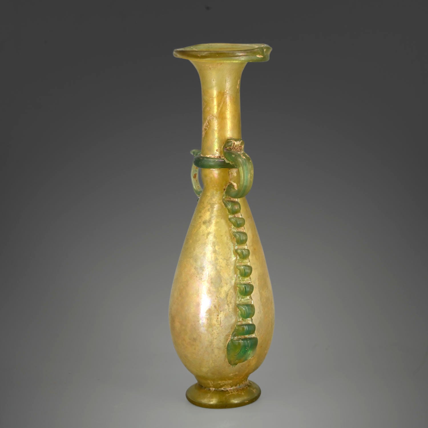 A fine Roman iridescent green/amber glass Amphoriskos, Late Imperial or Early Byzantine, ca. 3rd - 4th century CE