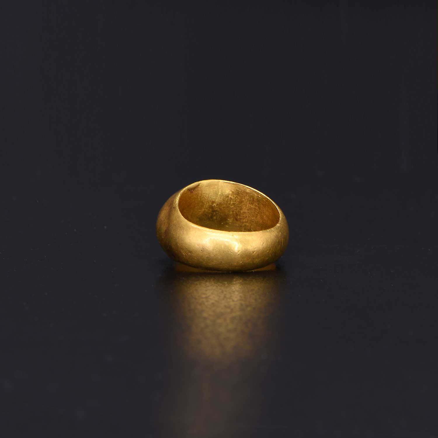 A Roman Gold Ring with Garnet Intaglio, Roman Imperial Period