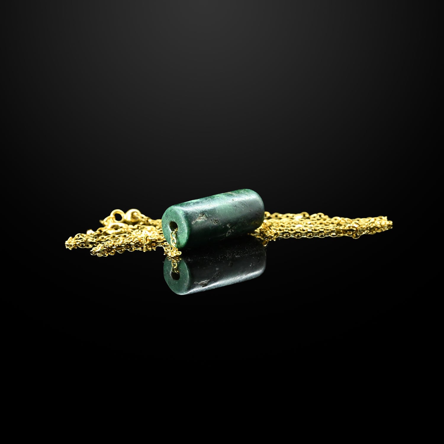 A Roman Malachite Bead Pendant, <br><em>Roman Imperial Period, ca. 1st century CE</em>