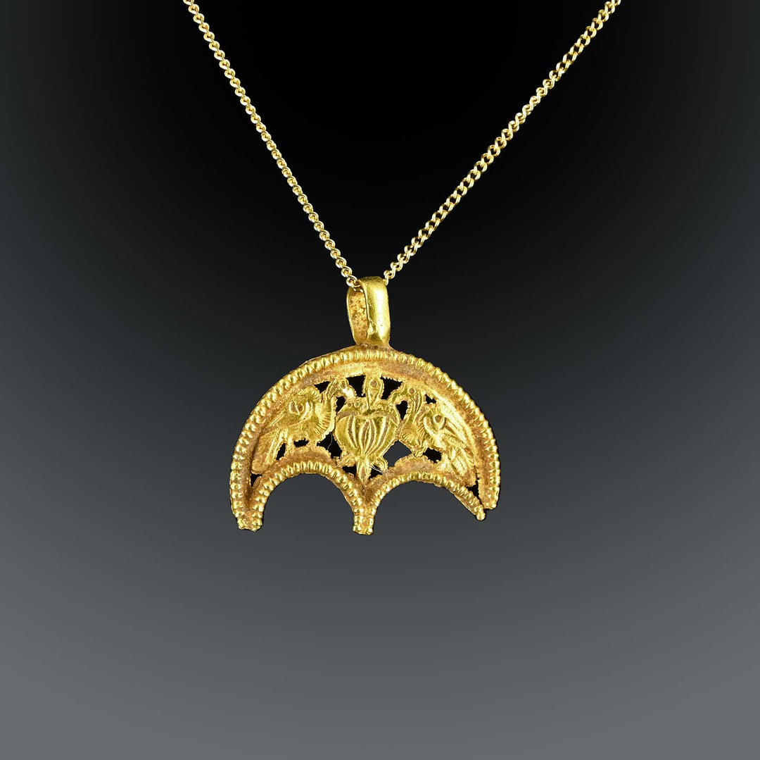 A Byzantine Gold Crescent Pendant with Peacocks, ca. 6th - 7th century CE
