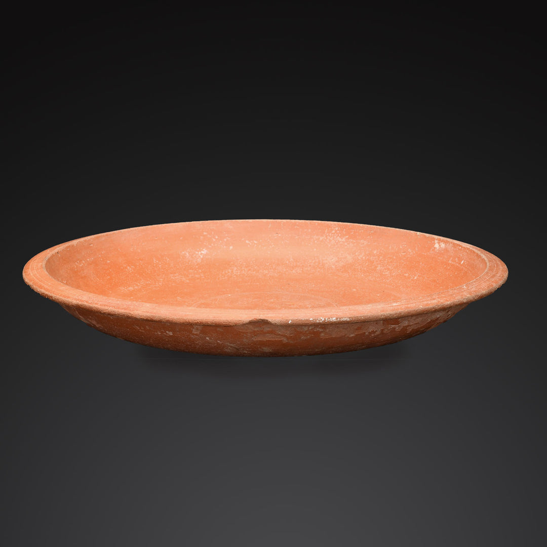 A large Roman Redware Dish, Late Imperial Period, ca. 4th century CE