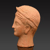 An Etruscan Terracotta Votive Head of A Goddess, ca. 4th - 3rd century BCE