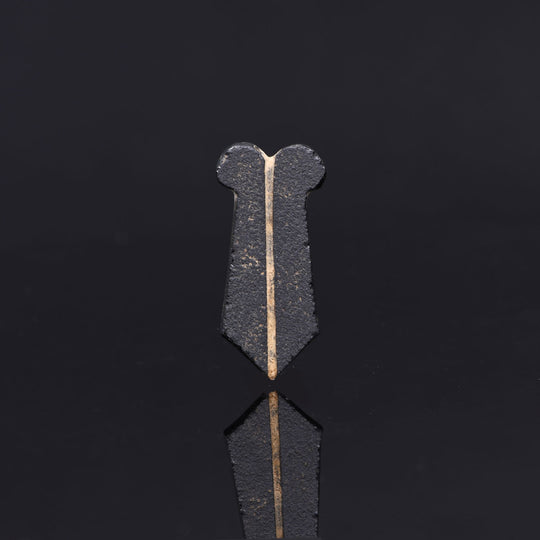 An Egyptian Obsidian Double Maat Feather Amulet, Late Period, 26th Dynasty, ca. 664 - 525 BCE